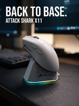 White ATTACK SHARK X11 gaming mouse docked on its RGB charging base