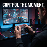 Gamer holding a GameSir G7 Pro controller in front of a gaming monitor